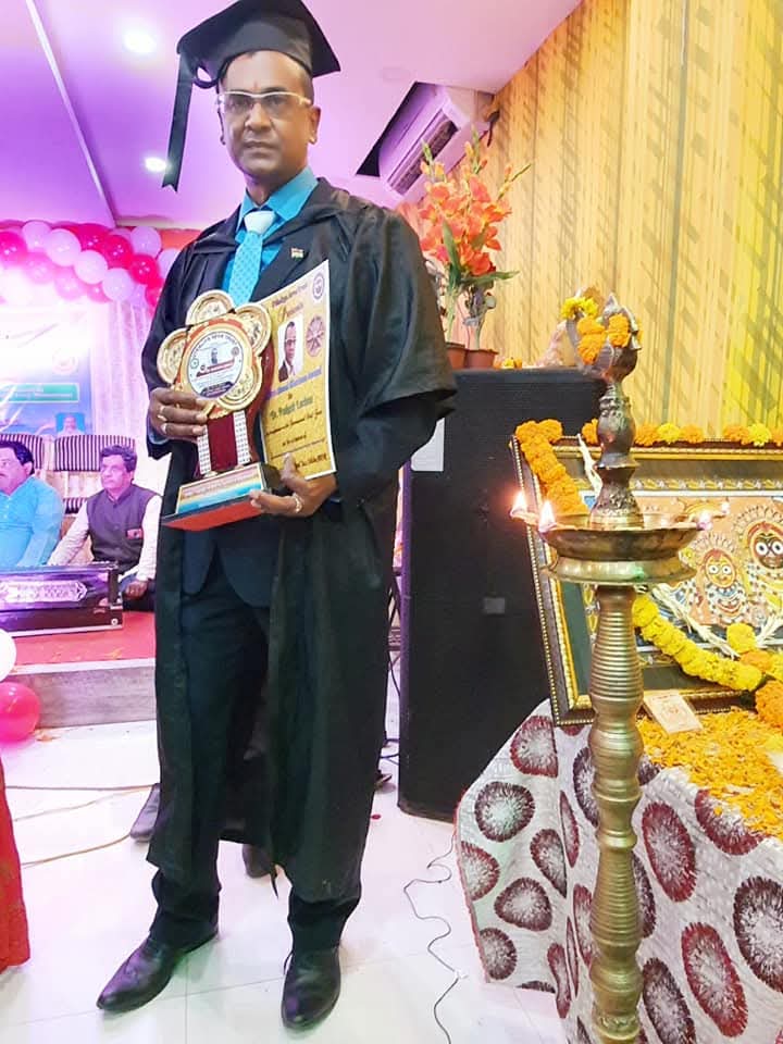 Jyotish Guru Award in academic regalia