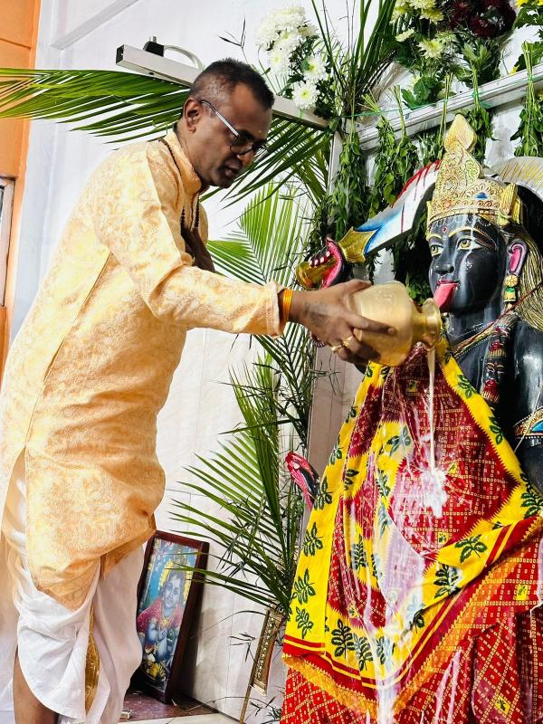 Performing pooja to Maa Kali deity
